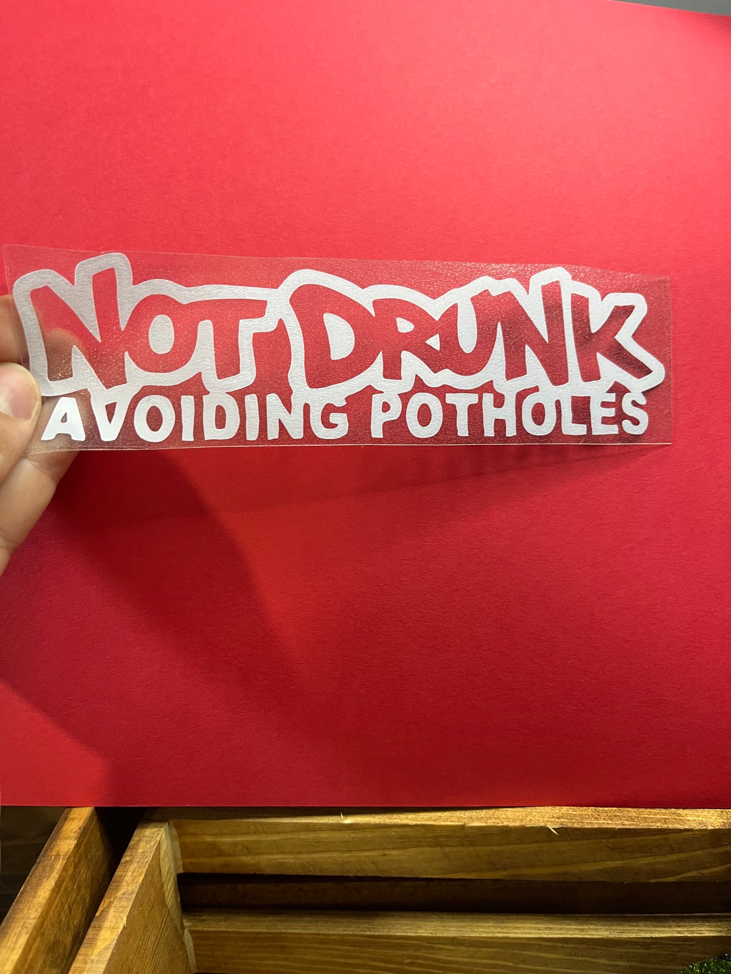 NOT DRUNK AVOIDING POTHOLES